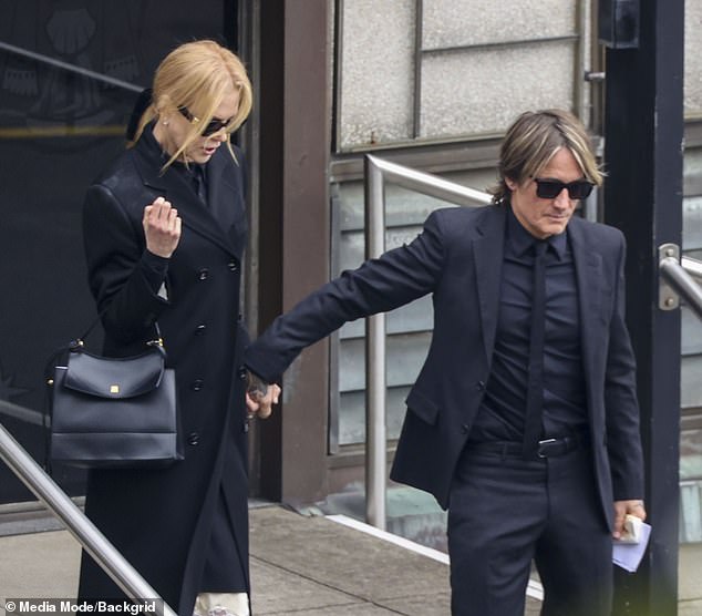 Nicole Kidman was supported by her loving husband Keith Urban as they attended her mother's funeral in Sydney.