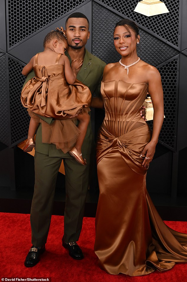 Victoria was previously in a relationship with fitness trainer John Gaines, with whom she shares a three-year-old daughter, Hazel Monét Gaines (pictured at the February Grammys).