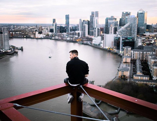 One image shows Stevenson resting on a metal beam overlooking the city of London.