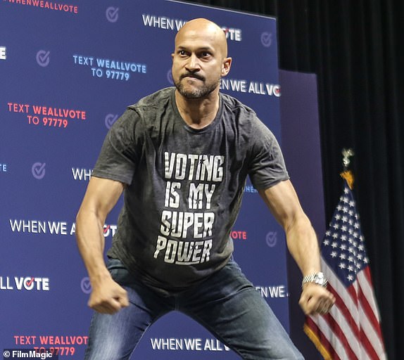 CORAL GABLES, FL - SEPTEMBER 28: Keegan-Michael Key speaks during a rally 