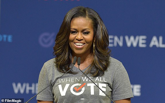 CORAL GABLES, FL - SEPTEMBER 28: Former First Lady Michelle Obama speaks during a rally 