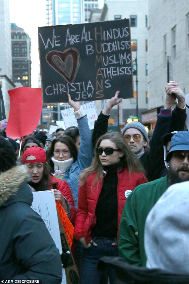 Bella and Gigi Hadid join the protest against President Trump's immigration ban on the streets of New York in January 2017.