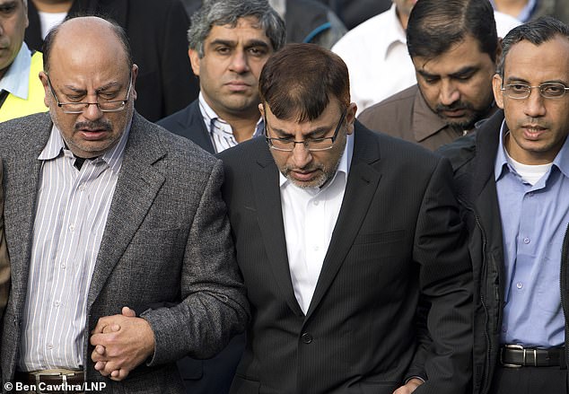 Father Dr. Abdul Shakoor was the only survivor of the arson attack. He is shown leading other members of the local Muslim community as they follow the funeral procession in 2012.