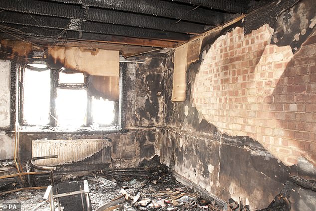 Major damage to the family home in Harlow, Essex, following the fatal fire in October 2012