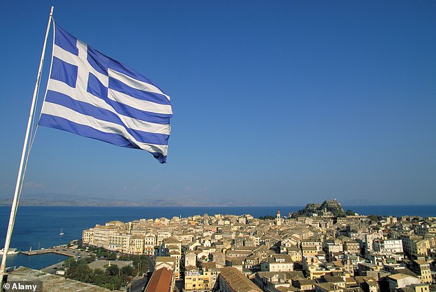 Pictured: A Greek flag flies over the island of Corfu.