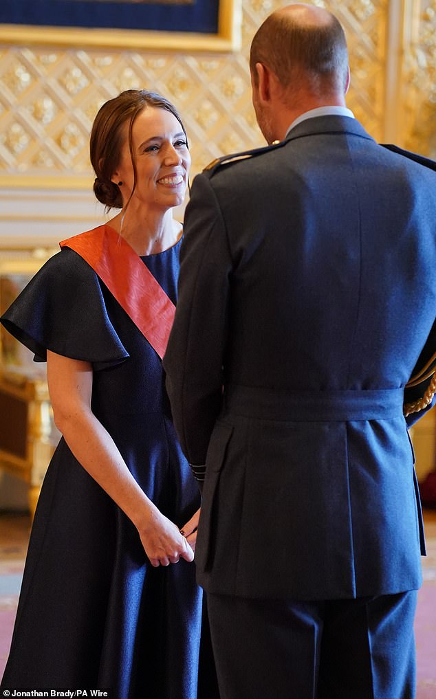 New Zealand Prime Minister Jacinda Ardern (pictured left) receives a damehood during an investiture at Windsor Castle today.