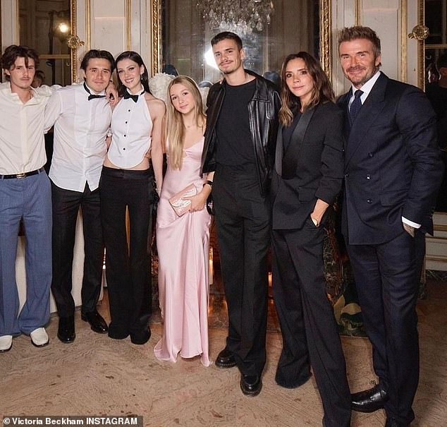 Last month, the family supported Victoria at her Paris Fashion Week show. LR: Cruz, Brooklyn, Nicola Peltz, Harper, Romeo, Victoria and David