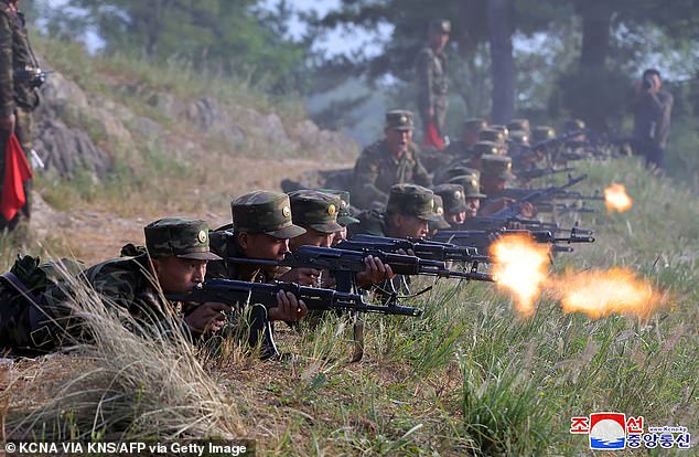 North Korea, like Iran, is also reported to supply weapons and ammunition. This photo taken on September 11 shows soldiers training at an undisclosed location in North Korea.