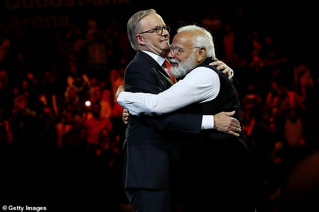 It is the first time India has been included in Australia's Working Holiday programme, and leaders say the visa will strengthen ties between the two countries (pictured: Indian Prime Minister Narendra Modi and Prime Minister of Australia, Anthony Albanese, hugging).