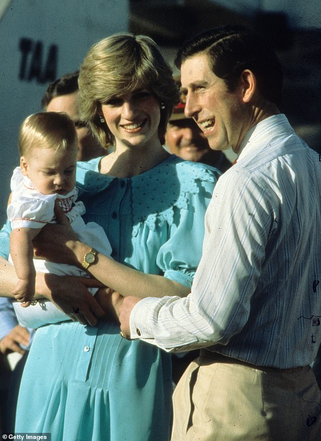 Diana holding Prince William as they arrive at Alice Springs airport at the start of their tour in March 1983.