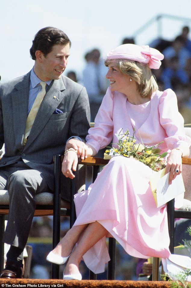 The Prince of Wales lends a loving hand to Diana during their first tour together in Australia