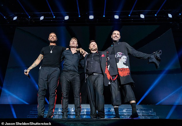 The band officially broke up in 2000, but have frequently reunited for landmark tours (pictured on stage in 2019).