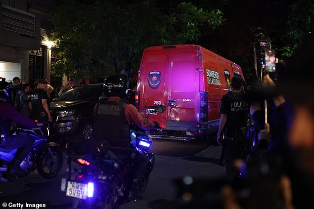 A fire ambulance leaves the Casa Sur Hotel in Buenos Aires with Payne's body