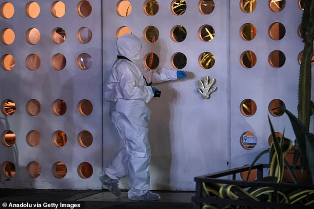 Forensic teams comb the Casa Sur Hotel in Buenos Aires where Payne fell to his death