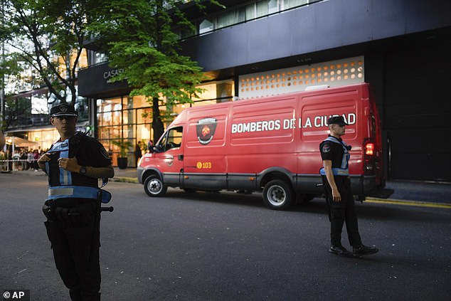 Emergency services arrive at the Casa Sur Hotel in Buenos Aires after Payne was found dead