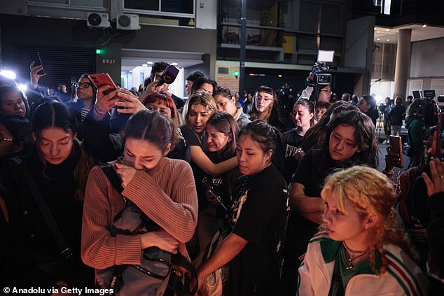 One Direction and Liam Payne fans gather outside the Casa Sur Hotel in Buenos Aires