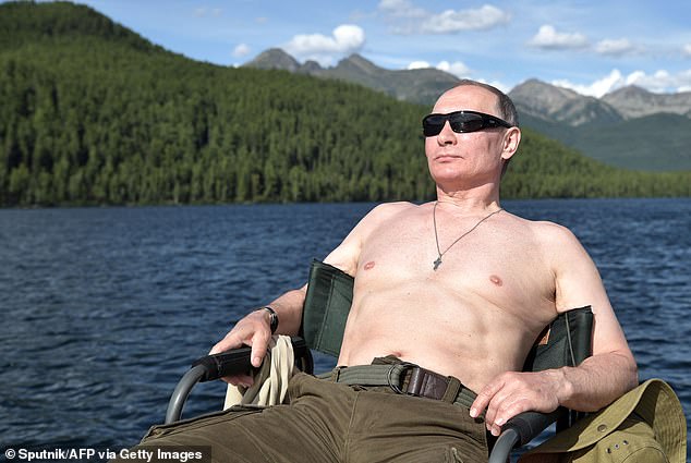 Russian President Vladimir Putin sunbathes during his vacation in the remote Tuva region of southern Siberia. The photograph was taken between August 1 and 3, 2017. Last month, it was revealed that Russian scientists had been ordered to hand over details of their latest anti-aging research in an alleged attempt to rejuvenate Putin. .