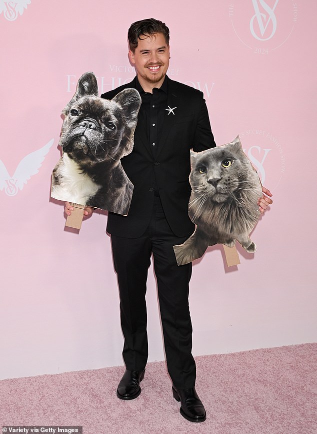 Barbara's husband, Dylan Sprouse, arrived on the pink carpet with cardboard cutouts of their pets.