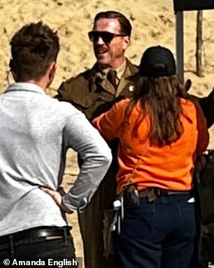 Earlier this month, Damian looked unrecognizable while filming new WWII drama Pressure Camber Sands Beach in East Sussex.