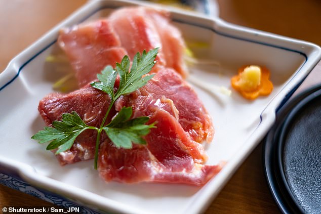 A Redditor visited Japan and ordered what he thought was fish sashimi. It turned out to be raw chicken (above, file image)