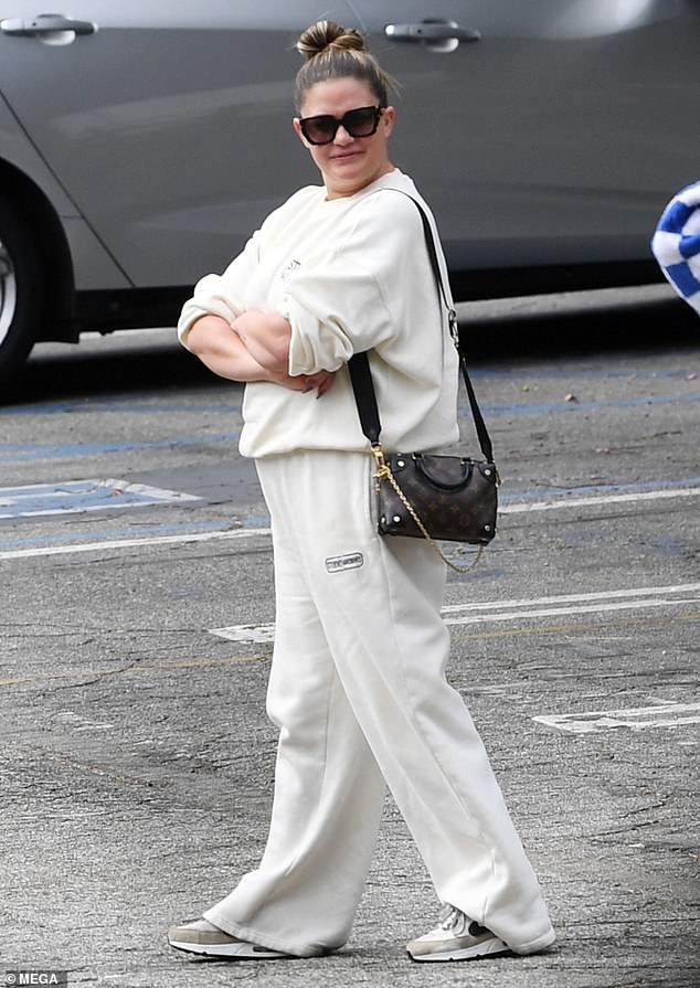 Brittany was dressed for comfort as she rocked a loose-fitting white tracksuit along with matching Nike sneakers.