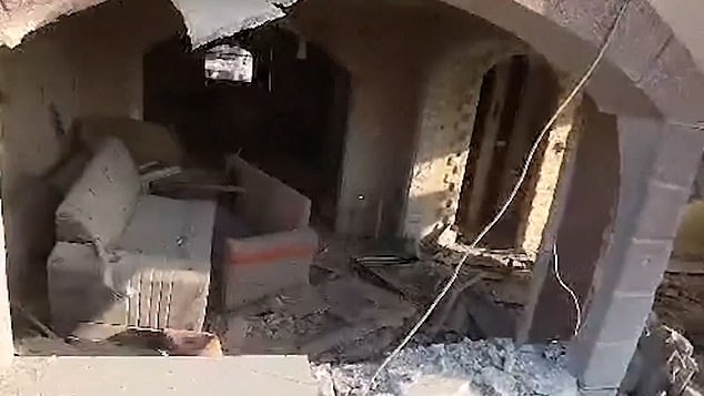 The drone flew into what was once a living room inside a bombed-out building in Gaza.