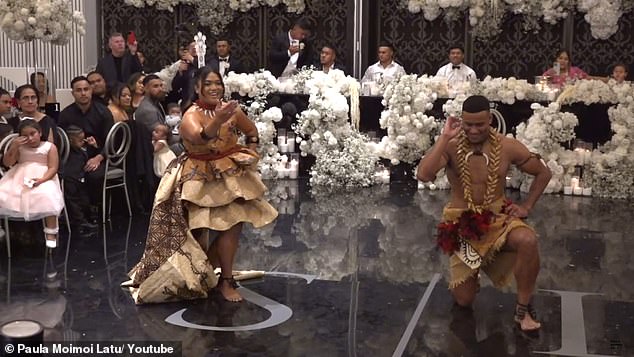 Crichton and Leona perform traditional Samoan dances at the reception following their recent wedding.