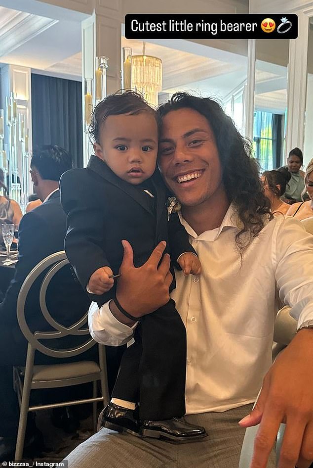 Outgoing Penrith Panthers star Jarome Luai with Brian To'o's son Atreus who was the wedding ring bearer.