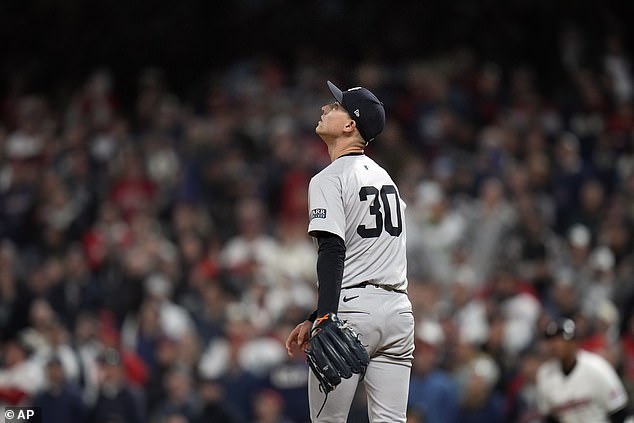 Yankees pitcher Luke Weaver watches Jhonkensey Noel's home run fly over the wall.