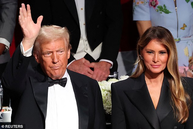 Trump greeted the crowd to applause while Melania broke into a smile.