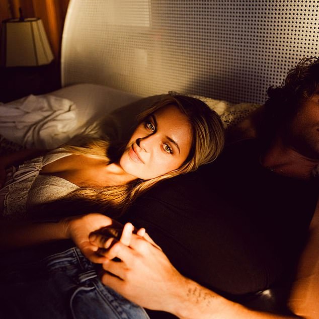 The singer also promoted the new clip on her Instagram, sharing a photo of her and Chase in bed.