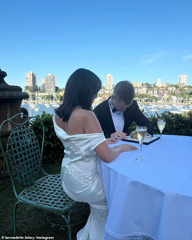 Caroline chose a gorgeous off-the-shoulder silk and lace dress for her wedding dress