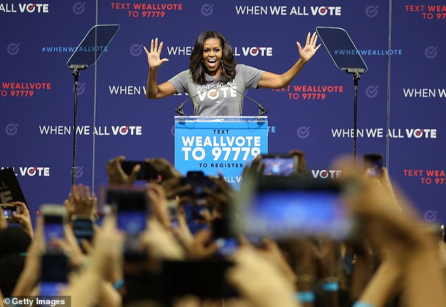 Former first lady Michelle Obama speaks during a National Week of Action When We All Vote rally at the University of Miami Watsco Center on September 28, 2018 in Coral Gables, Florida. Obama is the founder and co-president of the organization that aims to help people register and vote.