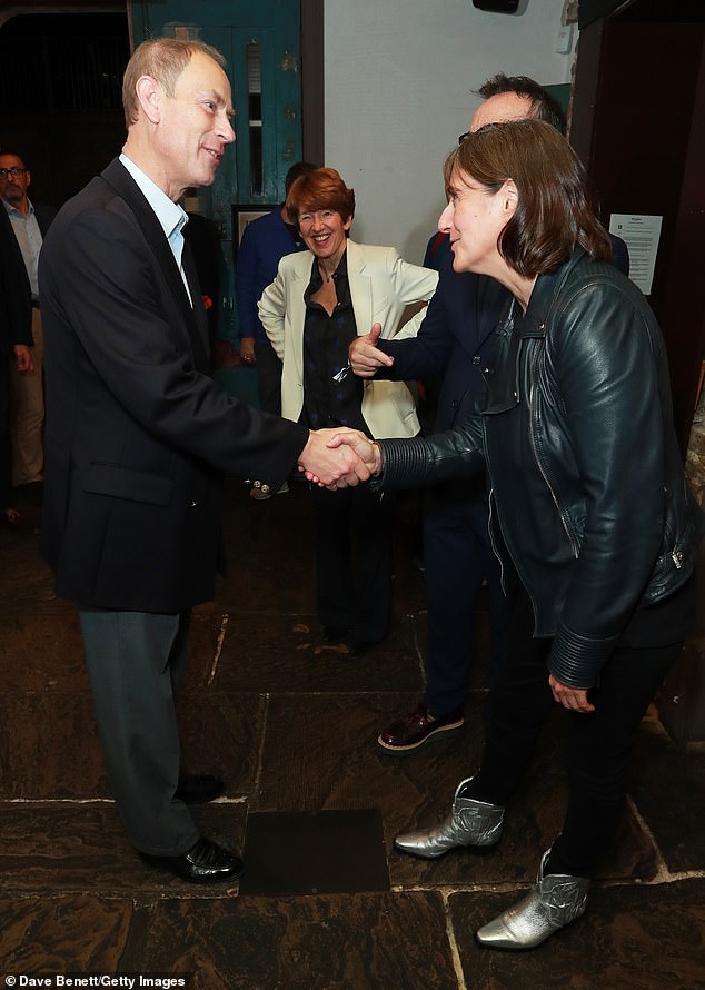 The 60-year-old greeted Wilton's Music Hall CEO Holly Kendrick (pictured).