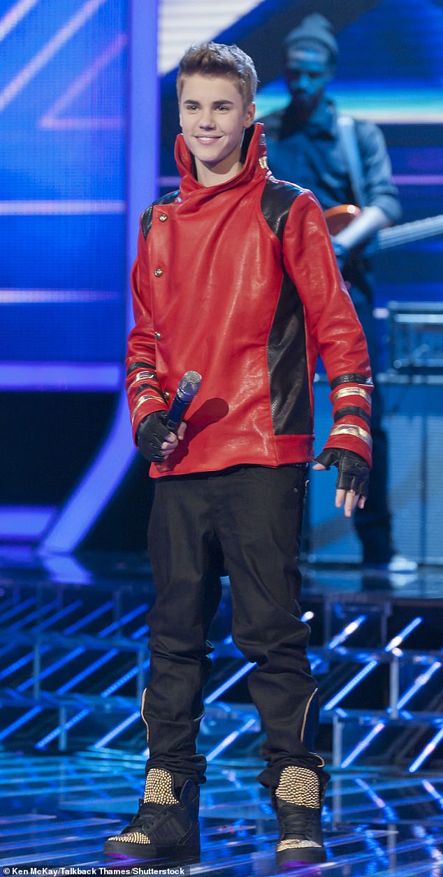 Justin performs on X Factor in 2011, a year after Liam came third as part of One Direction.