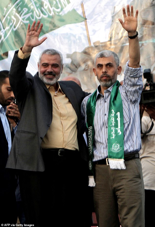 Sinwar became the new leader of the Iran-backed Palestinian group following the assassination of his former political chief Ismail Haniyeh (left) in July.