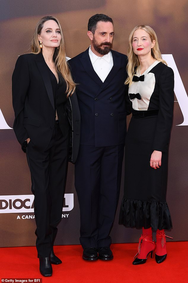 Angelina looked in good spirits as she posed on the red carpet alongside María director Pablo Larraín and co-star Alba Rohrwacher.