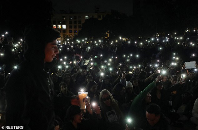 One Direction fans gather to pay tribute to Liam Payne, at the Monument to the Revolution, in Mexico City