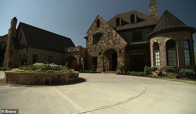 In a bizarre incident, she alleges that she found him unconscious in her closet after trying to spy on her; (pictured: Kim and Kroy's home in Georgia)