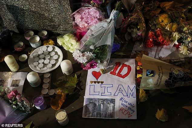 Heartbroken fans left heartfelt messages, flowers, candles and balloons for Liam Payne in his hometown.