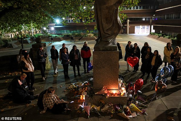 Mourners stand around Lady Wulfrun statue to mourn Liam Payne tonight