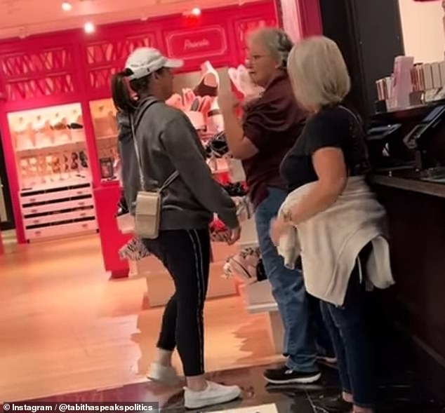 After Karen, on the left, was pushed to the ground, she returned to face the fists of an older lady.