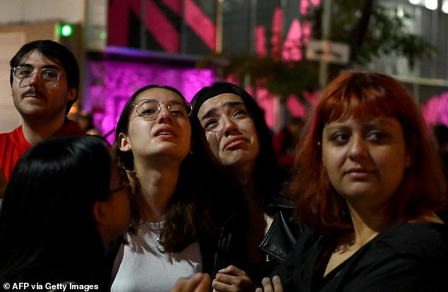 Excited fans photographed outside the Casa Sur Palmero hotel this