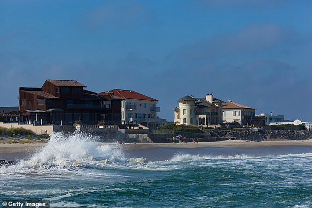 People enjoy one of the last days of summer in the Jersey Shore beach community of Deal, which jumped from 70th place last year, with a median of $2.1 million, to 32nd with $2.95 million dollars.