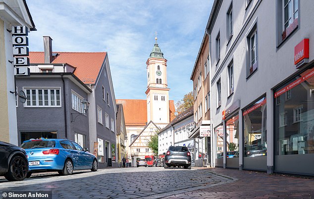 A view of a Krumbach street shows the town's clock tower.