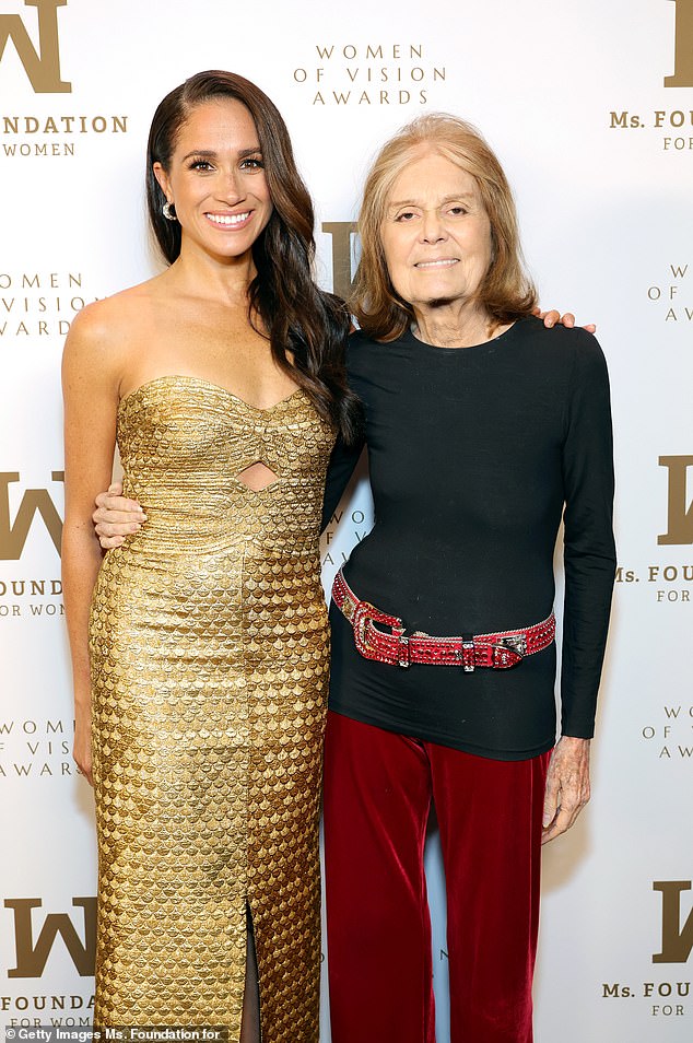 The Duchess put her hand on the shoulder of journalist and social activist Gloria Steinem earlier this year.