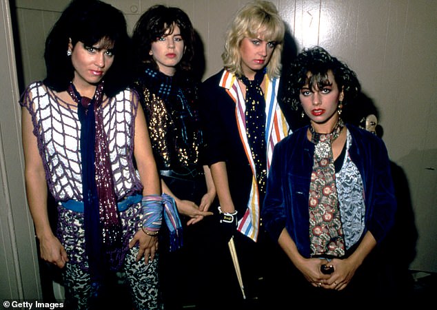 Hoffs' (left) famous band, The Bangles, formed in 1981 when he met sisters Vicki (left) and Debbi Peterson (second from right); Pictured with bassist Michael Steele (second left).