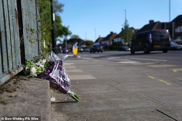 Flowers at the site near the A20 and Kidbrooke Park Road in Eltham, south east London