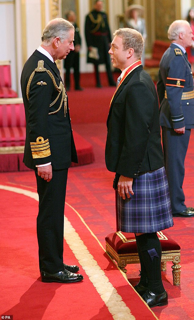 Today he was knighted by King Charles (left), when the monarch was serving as Prince of Wales.