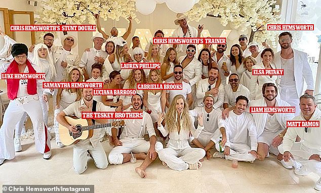 Phillips was invited to the Hemsworths' famous 'white party' in May 2021, which was attended by a who's who of Byron Bay's elite group of Australian and American celebrities who live full or part-time in the coastal town of New South Wales. (Pictured: guest poses for a group photo)